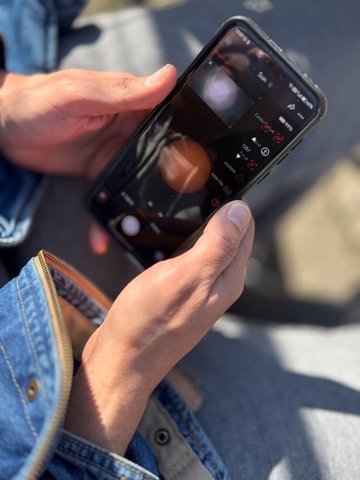Placeholder — a social media content shoot in progress with a ring light and phone rig