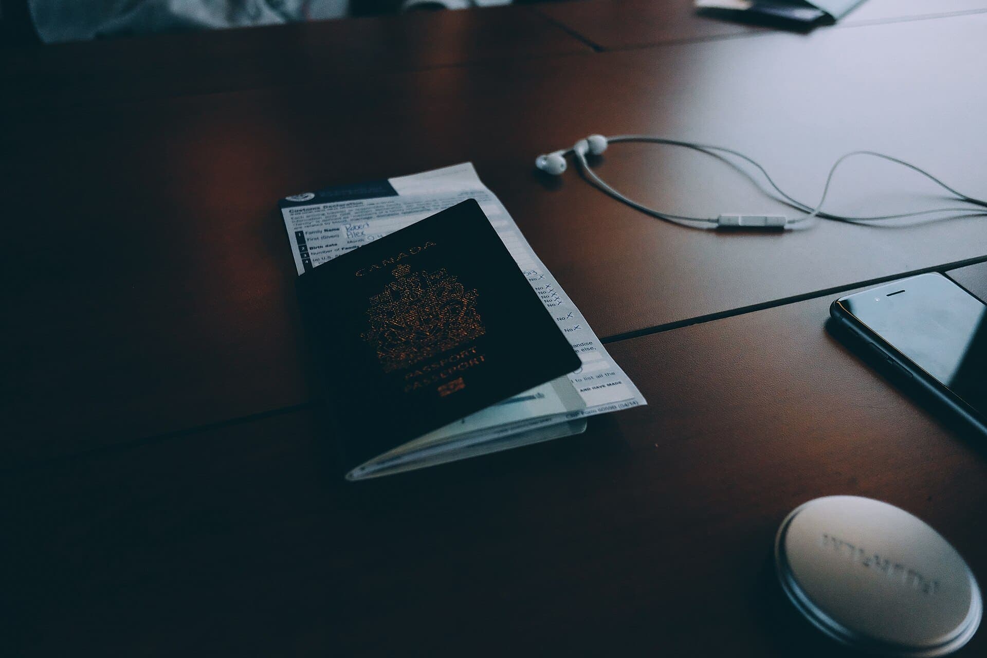 Placeholder — a passport photo being printed at a photo counter