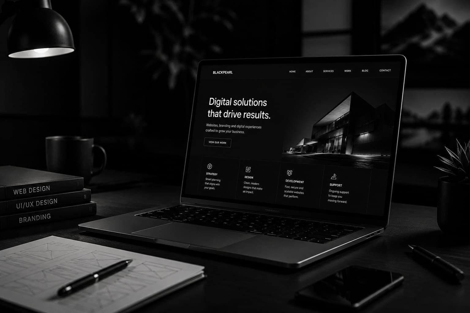 Placeholder — website design displayed on a laptop screen
